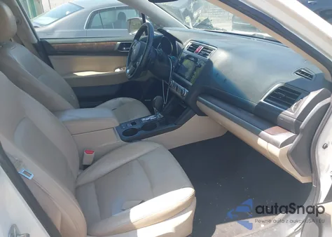 2015 Subaru Outback 3.6R Limited из США, поврежденный, VIN 4S4BSENC0F3240221